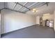 Spacious garage with epoxy flooring and ample storage space at 8737 Red Brook Dr # 204, Las Vegas, NV 89128
