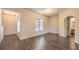 Bright living room space with large windows and archway to ensuite bathroom at 8737 Red Brook Dr # 204, Las Vegas, NV 89128