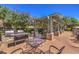 Enjoy outdoor dining and entertaining with a built-in kitchen and comfortable seating area at 8737 Red Brook Dr # 204, Las Vegas, NV 89128