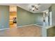 Open concept living room with tile floors that flows seamlessly to the kitchen at 904 Big Horn St, Henderson, NV 89002