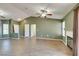 Living room features vaulted ceilings, tile floors, a fireplace and view of the kitchen at 904 Big Horn St, Henderson, NV 89002