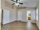 Main bedroom with tile flooring, neutral paint, and ensuite bathroom at 904 Big Horn St, Henderson, NV 89002