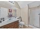 Bright bathroom featuring a shower, vanity, and ceramic tile floors at 9118 Mount Wilson St, Las Vegas, NV 89113