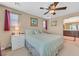 Comfortable bedroom with a ceiling fan, and an ensuite bathroom at 9118 Mount Wilson St, Las Vegas, NV 89113