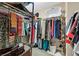 Walk-in closet filled with clothing and storage accessories at 9118 Mount Wilson St, Las Vegas, NV 89113
