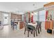 Bright kitchen and dining area with granite counters, stainless appliances, and a breakfast nook at 9118 Mount Wilson St, Las Vegas, NV 89113