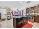 Gourmet kitchen with stainless steel appliances, granite countertops, and ample cabinet space at 9118 Mount Wilson St, Las Vegas, NV 89113
