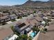 Neighborhood aerial view showing a pool at 93 Autumn Day St, Henderson, NV 89012