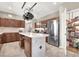 Spacious kitchen featuring stainless steel appliances, a center island, and a walk-in pantry at 93 Autumn Day St, Henderson, NV 89012