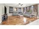 Comfortable living room with hardwood floors, fireplace, and plush seating at 93 Autumn Day St, Henderson, NV 89012