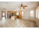 Open kitchen featuring tile floors, stainless steel appliances, and wood cabinetry at 9312 Poseidon Valley Ave, Las Vegas, NV 89178