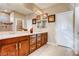 Bright bathroom with double sink vanity, tile backsplash, and walk-in shower at 9537 Wild Valley Ave, Las Vegas, NV 89148