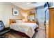 Comfortable bedroom with natural light, ceiling fan, and cozy furniture at 9537 Wild Valley Ave, Las Vegas, NV 89148