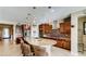 Spacious kitchen featuring a large island, stainless steel appliances, and wood cabinets at 9537 Wild Valley Ave, Las Vegas, NV 89148