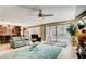 Bright living room with large sliding glass doors opening to the patio, offering ample natural light at 9537 Wild Valley Ave, Las Vegas, NV 89148