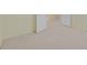 Bedroom with plush carpeting and a glimpse of an open doorway at 9746 Driftwood Island Ct, Las Vegas, NV 89148