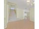 Open entryway featuring a chandelier, staircase and light, neutral paint at 9746 Driftwood Island Ct, Las Vegas, NV 89148