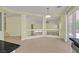 Open-concept kitchen with island and backyard access at 9746 Driftwood Island Ct, Las Vegas, NV 89148