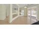 Spacious open-concept living room, hardwood floors, and natural light at 9746 Driftwood Island Ct, Las Vegas, NV 89148