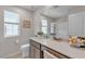 Bright bathroom featuring large mirror, ample counter space, and window at , Henderson, NV 89044