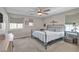 Bright bedroom featuring a modern ceiling fan and two windows at , Henderson, NV 89044