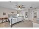 Bedroom with a ceiling fan, two windows and small desk at , Henderson, NV 89044