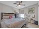 Bright bedroom with a decorative bed, dresser, and charming decor, perfect for relaxation at , Henderson, NV 89044