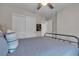 Well-lit bedroom featuring a ceiling fan, a closet, and a calming color palette at , Henderson, NV 89044