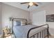 Comfortable bedroom with a ceiling fan, a cozy bed, and a closet for ample storage space at , Henderson, NV 89044