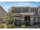 Charming two-story townhome featuring a gated front porch and desert landscaping for easy maintenance at , Henderson, NV 89044