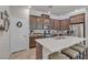 Modern kitchen featuring stainless steel appliances, a large island with seating, and ample cabinet space at , Henderson, NV 89044
