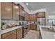 Contemporary kitchen boasts stainless steel appliances, sleek countertops, and stylish cabinetry at , Henderson, NV 89044