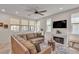 Bright living room featuring a comfortable sectional sofa and a cozy fireplace for a relaxing atmosphere at , Henderson, NV 89044