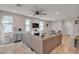 Spacious living room with tile floors, a fireplace, and a ceiling fan, ideal for relaxation at , Henderson, NV 89044
