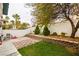 Private backyard featuring a concrete patio and tiered garden beds at , Las Vegas, NV 89145