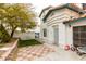 Two-story townhome featuring a private entry courtyard with green grass at , Las Vegas, NV 89145