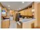 Efficient kitchen featuring wooden cabinets, stainless steel fridge, and modern appliances at , Las Vegas, NV 89145