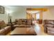 Cozy living area with leather seating, view to the staircase, and a doorway at , Las Vegas, NV 89145