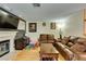 Inviting living room features a fireplace, leather seating, and a colorful alphabet mat at , Las Vegas, NV 89145