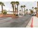 Gated community entrance featuring palm trees and white buildings at , Las Vegas, NV 89145