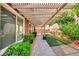 The backyard features an expansive covered patio and meticulously kept landscaping at 10247 Jamapa Dr, Las Vegas, NV 89178
