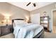 Inviting bedroom features a cozy bed with side tables, closet, and soft lighting for a relaxing ambiance at 10247 Jamapa Dr, Las Vegas, NV 89178