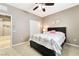 Bright bedroom with carpet, a bed, a closet, and ample natural light creating a comfortable space at 10247 Jamapa Dr, Las Vegas, NV 89178
