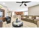 Open living area featuring a spacious layout connecting to the dining area and kitchen at 10247 Jamapa Dr, Las Vegas, NV 89178