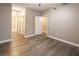 Inviting bedroom with hardwood floors, neutral paint, and ample closet space offering a peaceful retreat at 10291 Delta View Ct # 101, Las Vegas, NV 89129