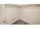 Walk-in closet featuring wood-look floors, base trim, and white walls with shelving at 10291 Delta View Ct # 101, Las Vegas, NV 89129