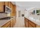 Stylish kitchen with modern appliances, granite countertops, and ample storage, designed for cooking and entertaining at 10680 Sapphire Vista Ave, Las Vegas, NV 89144