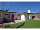 Backyard featuring artificial turf, a seating area, and a swing set for outdoor enjoyment at 109 Ash St, Henderson, NV 89015