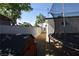 Side yard featuring a trampoline and play structure, perfect for Gathering fun and entertainment at 109 Ash St, Henderson, NV 89015