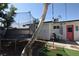 Backyard with a trampoline and outdoor play area, perfect for recreation and entertainment at 109 Ash St, Henderson, NV 89015